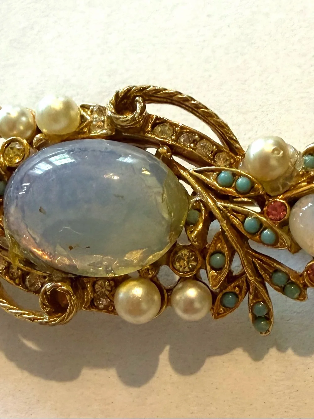 Gold-Tone Opalescent Blue Cabochon Brooch with Pearls and Turquoise Accents